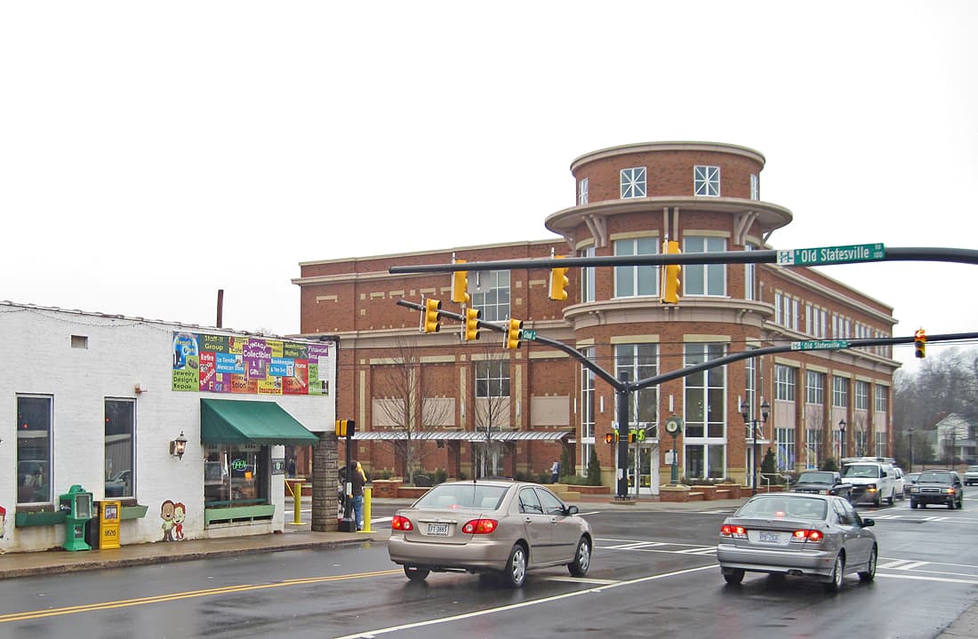 Brick buildings at an intersection in downtown Huntersville, NC
